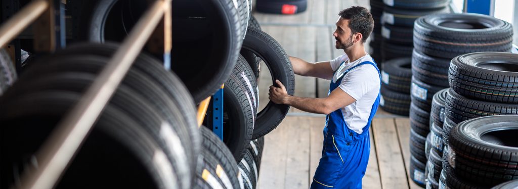 Auto mechanic  choose tire for car